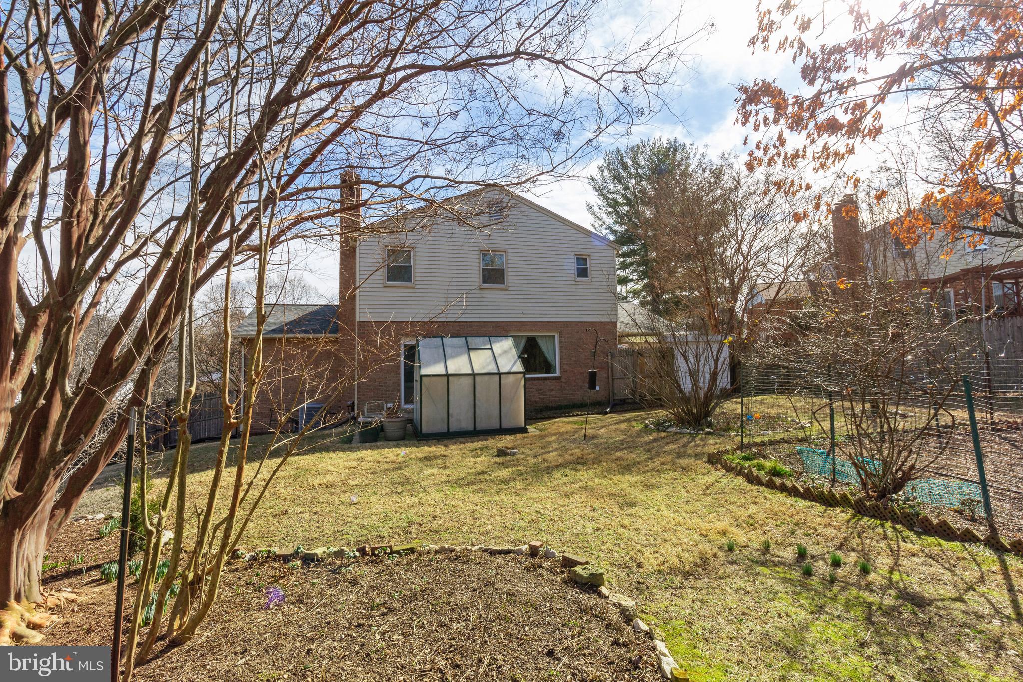 1817 Snowdrop Lane Silver Spring, MD 20906 - Photo 30 of 30 Backyard with Greenhouse