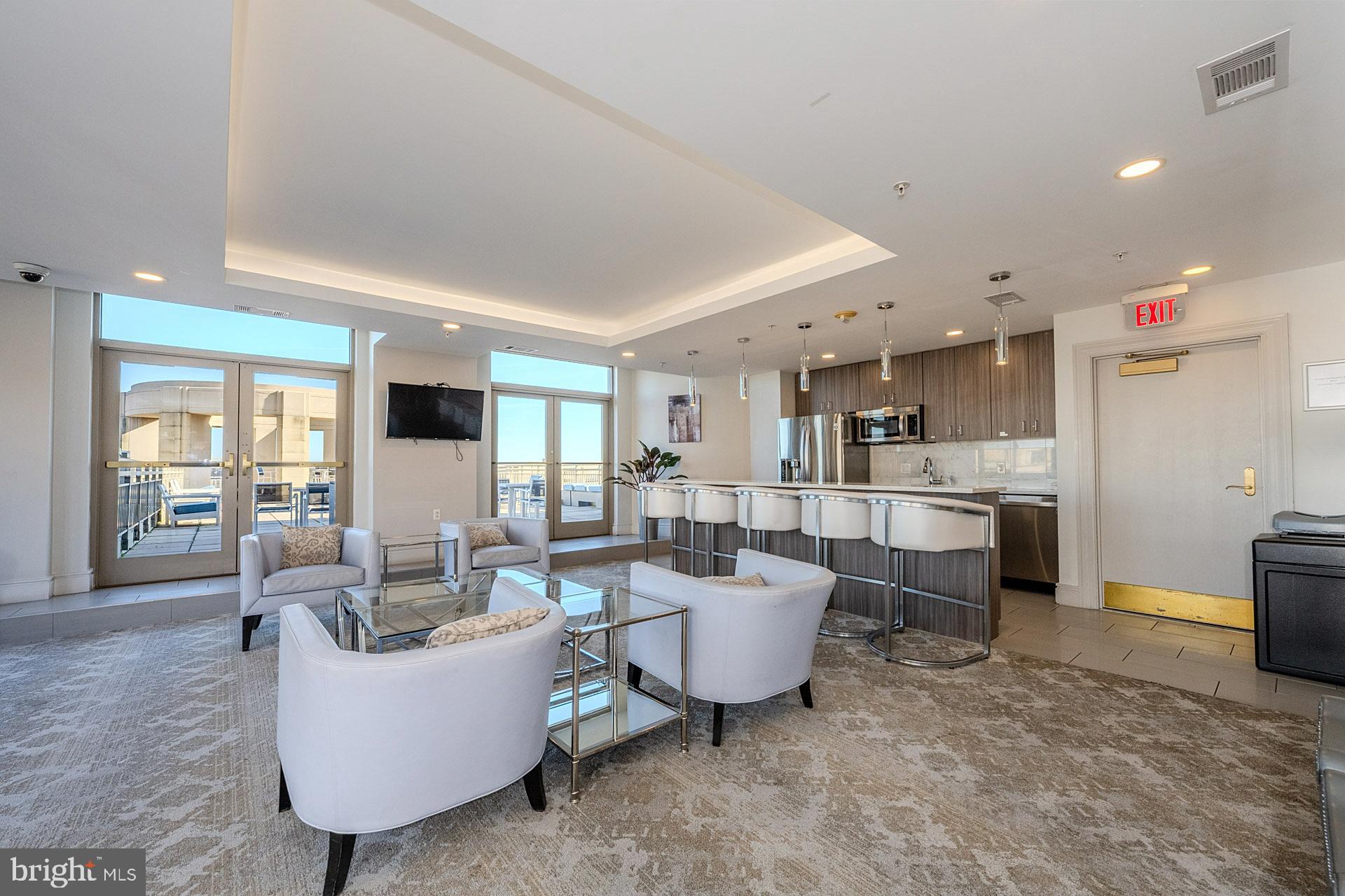 3650 South Glebe Road, Unit 460 Arlington, VA 22202 - Photo 28 of 38 a living room with furniture and a large window