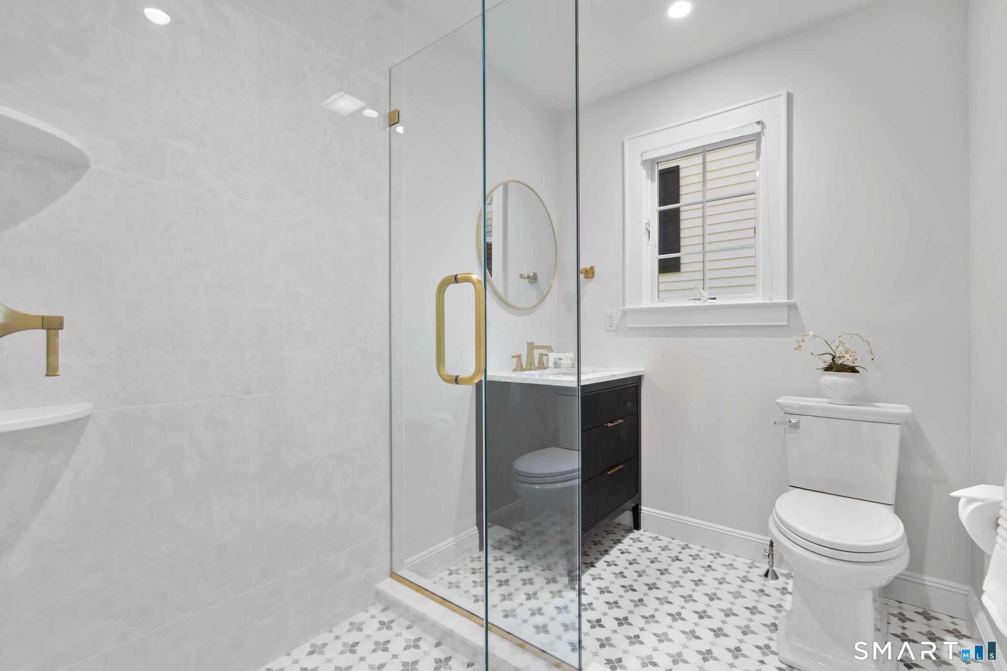 181 Old Branchville Road Ridgefield, CT 06877 - Photo 21 of 40 a bathroom with a toilet sink and shower