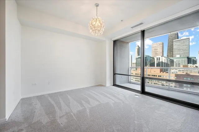 a view of an empty room and window