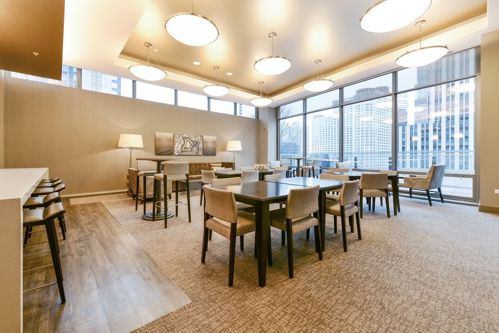 240 East Illinois Street, Unit 2204 Chicago, IL 60611 - Photo 50 of 50 a group of people sitting at tables in a room