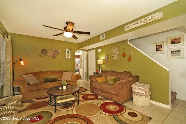 a dining room with a table and chairs