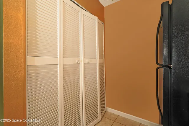 a bathroom with a shower and a mirror