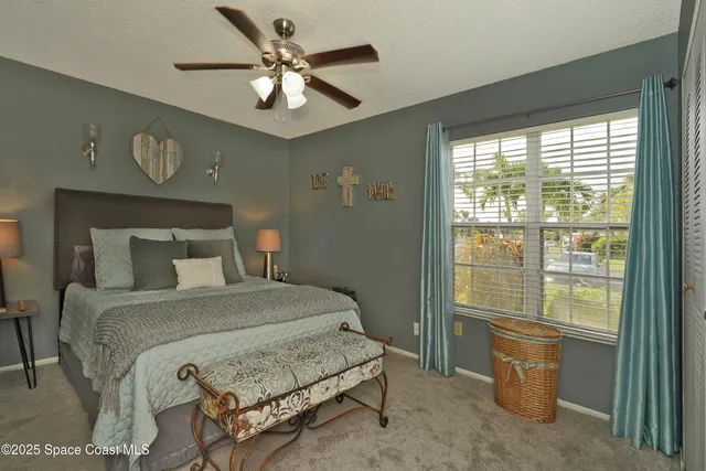 a bathroom with a sink vanity granite toilet and shower