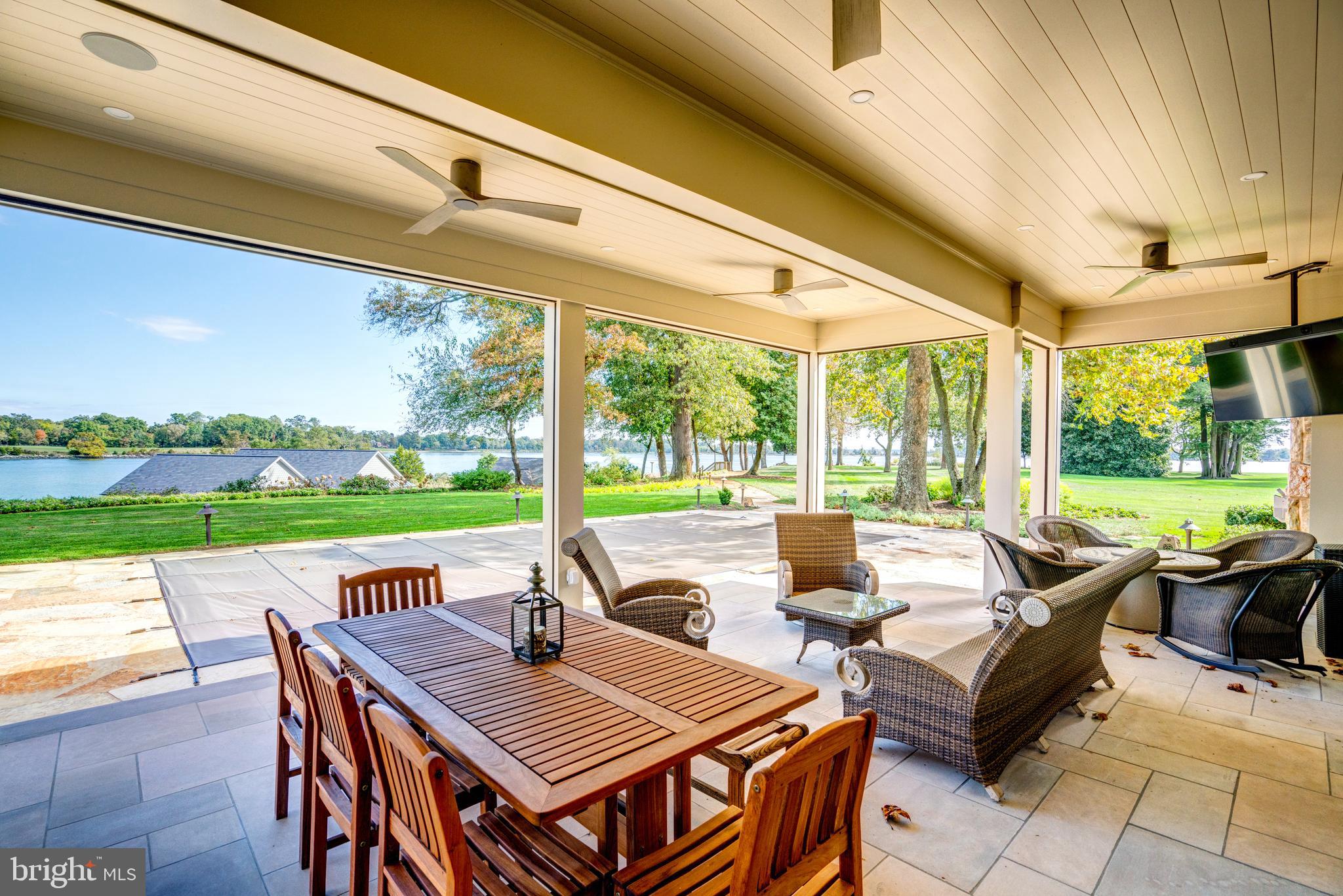 1441 Sharps Point Road Annapolis, MD 21409 - Photo 37 of 50 Porch with electric screens