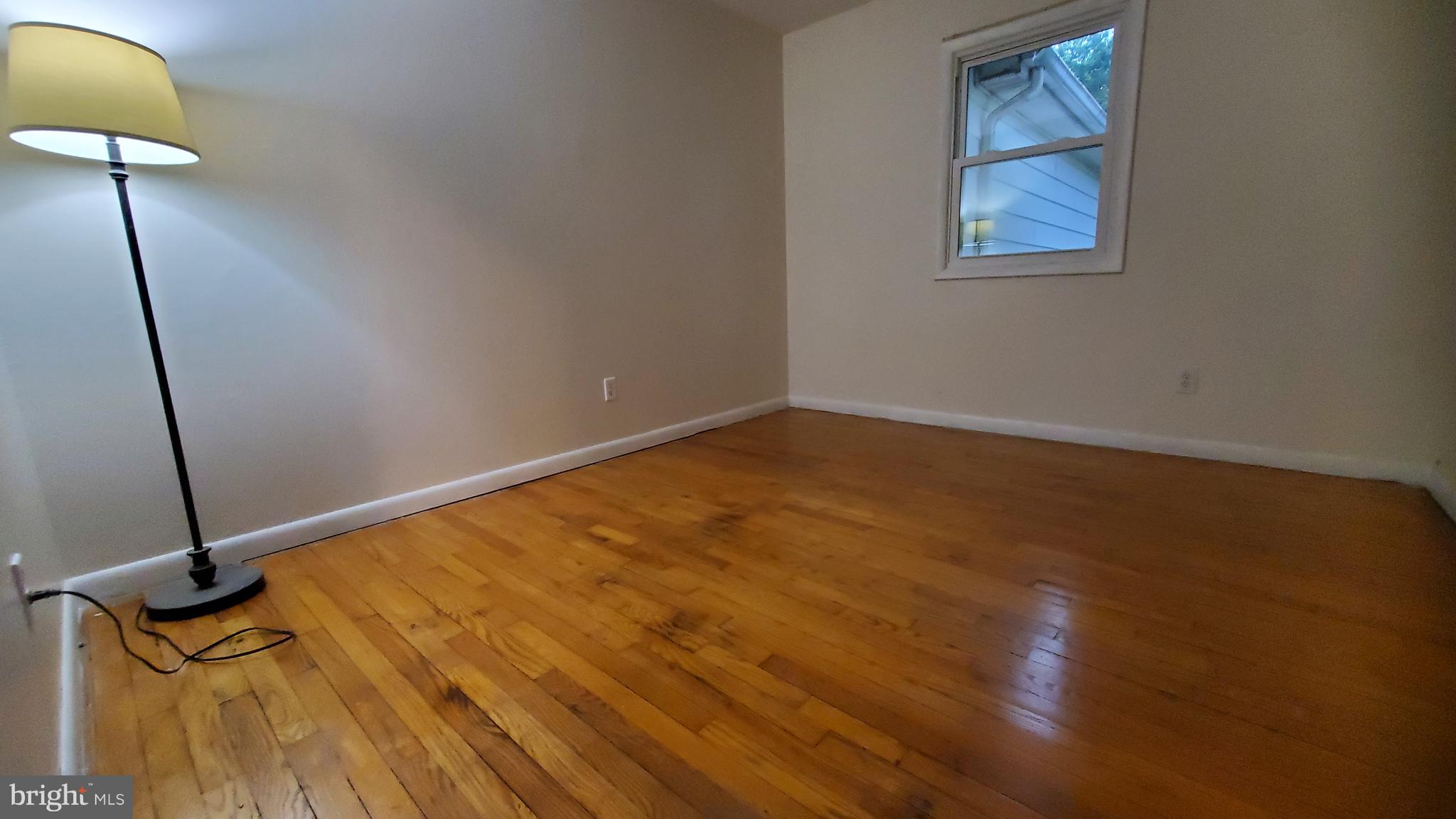 70 Zion Acres Road North East, MD 21901 - Photo 13 of 21 a view of a room with wooden floor and a window