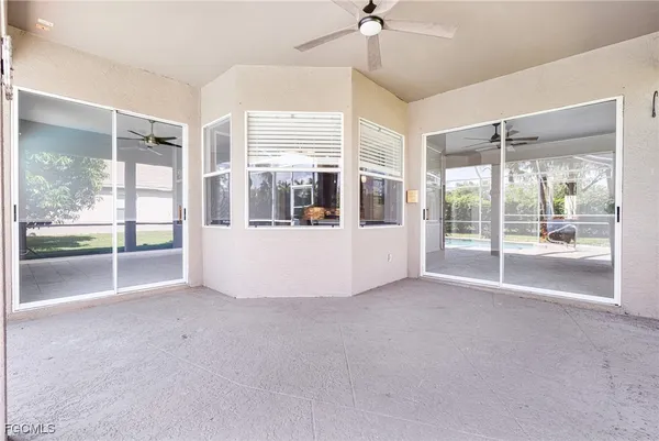 a view of an empty room with a sliding door