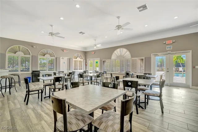 a view of a dining room with furniture window and outside view