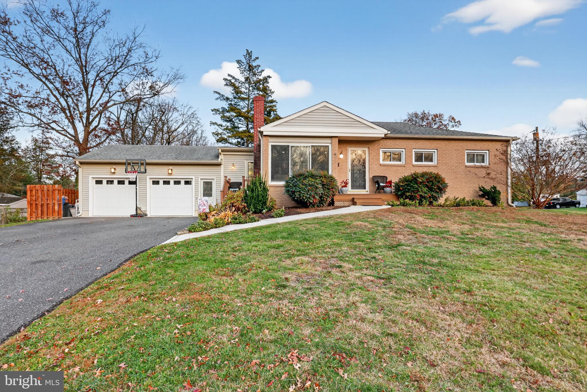 709 Manor Terrace Moorestown, NJ 08057 - Photo 1 of 37 a front view of a house with garden