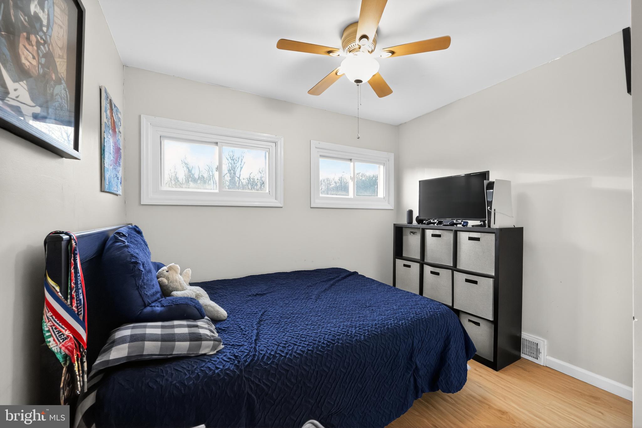 709 Manor Terrace Moorestown, NJ 08057 - Photo 19 of 37 a bedroom with a bed and wooden floor