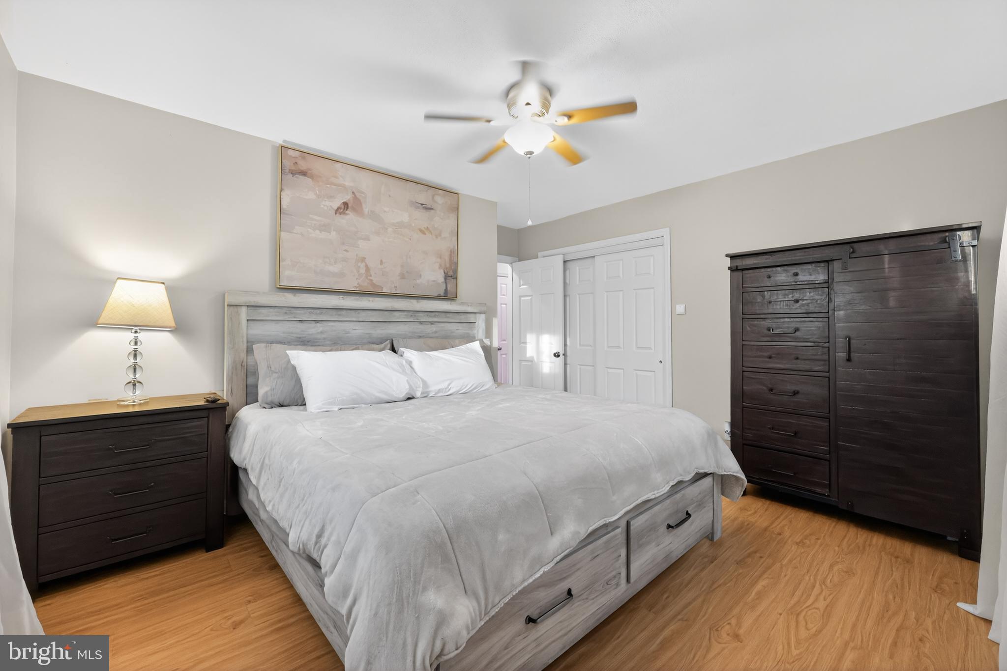 709 Manor Terrace Moorestown, NJ 08057 - Photo 20 of 37 a bedroom with a bed and a lamp on dresser