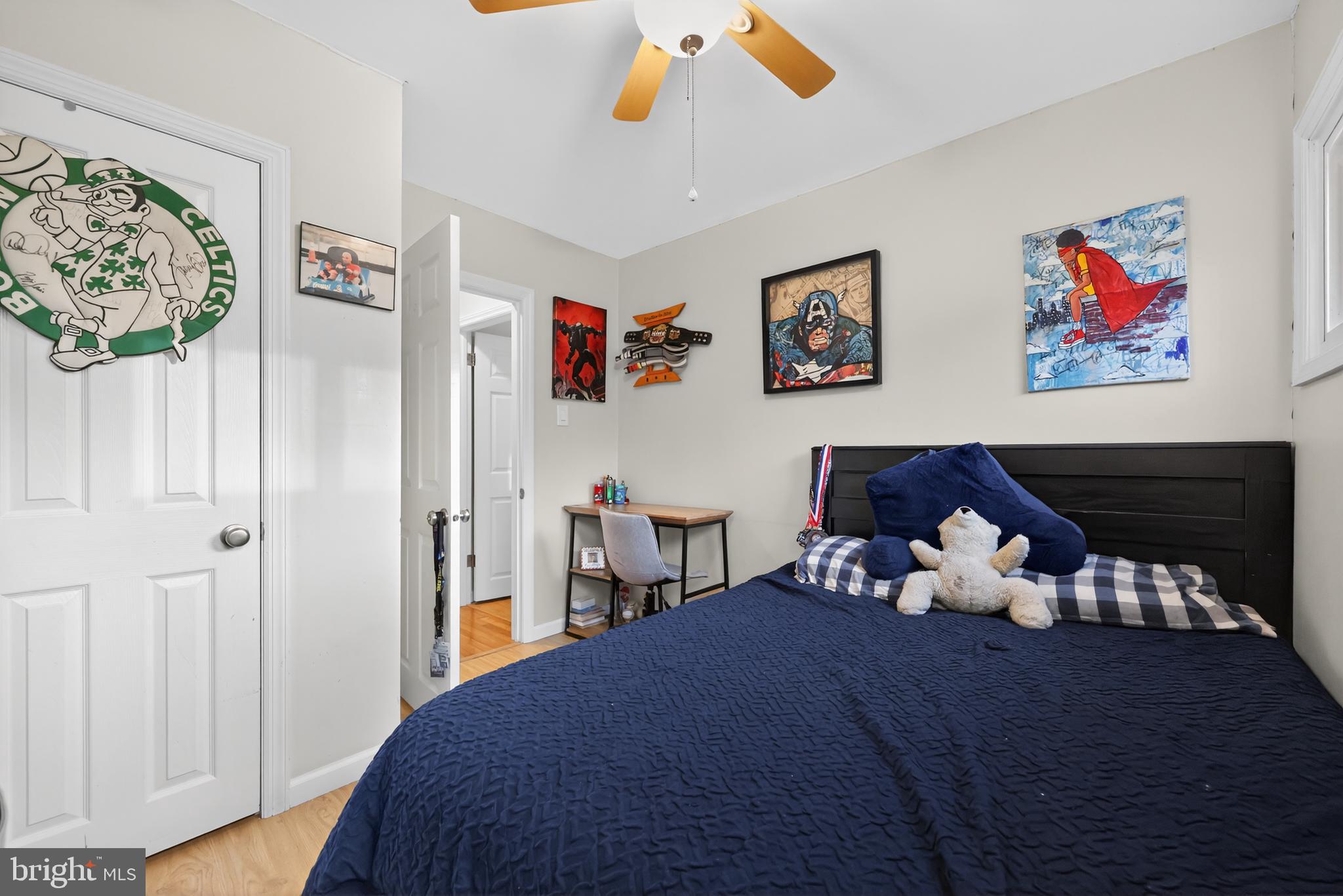 709 Manor Terrace Moorestown, NJ 08057 - Photo 22 of 37 a bed room with a bed and a painting on the wall