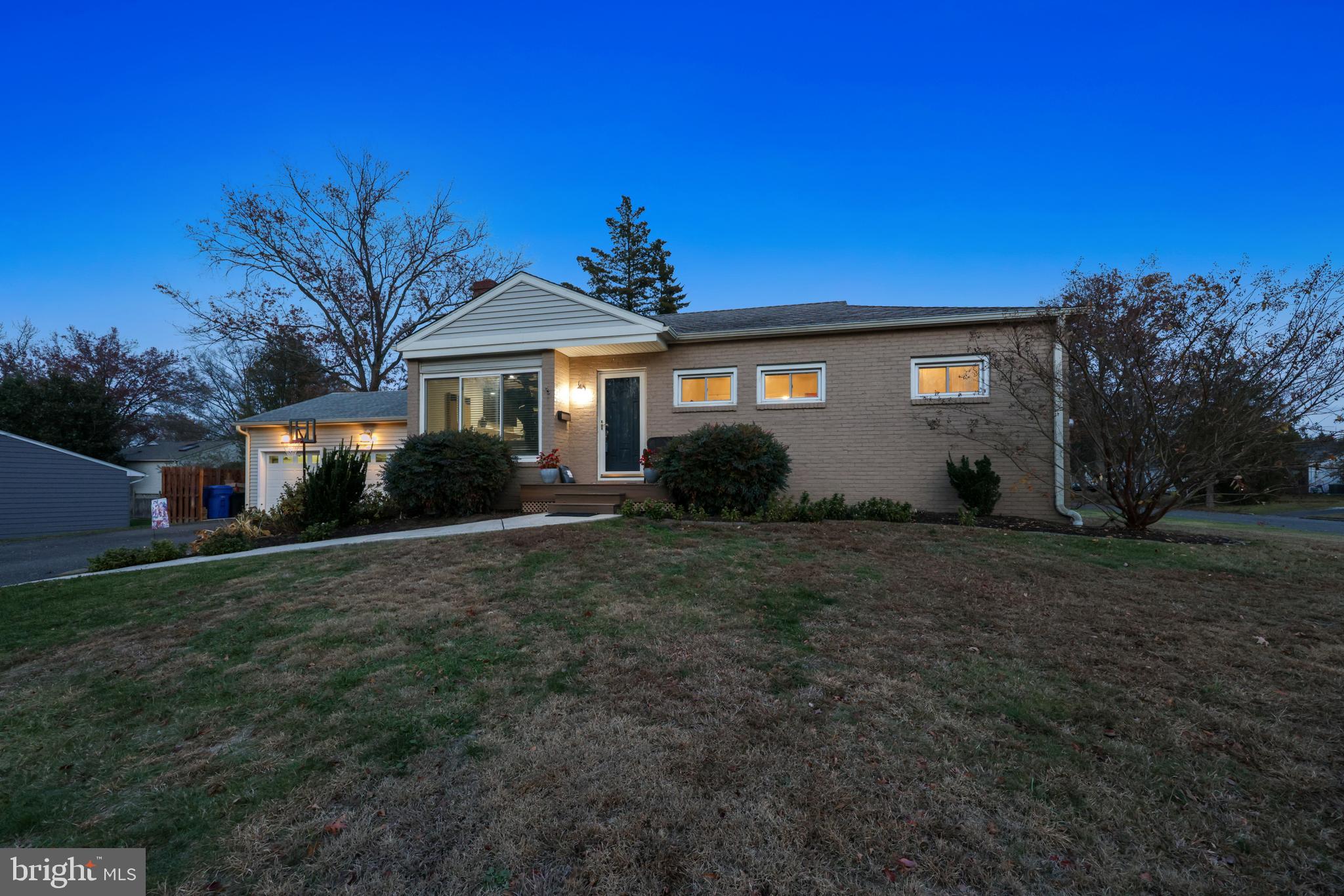 709 Manor Terrace Moorestown, NJ 08057 - Photo 31 of 37 a front view of a house with garden
