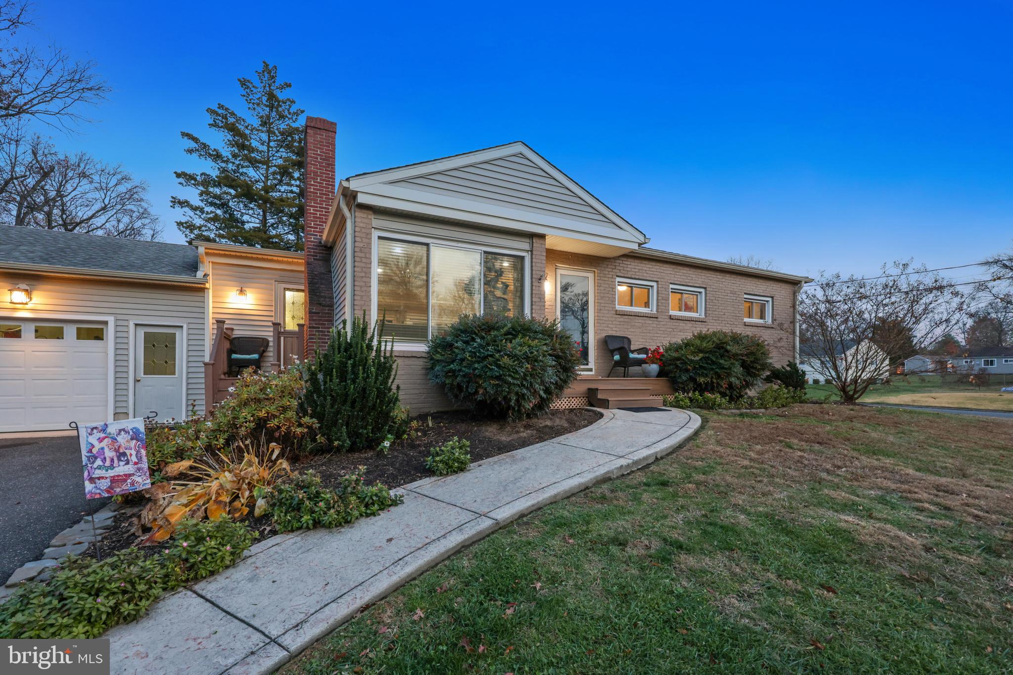 709 Manor Terrace Moorestown, NJ 08057 - Photo 33 of 37 a front view of a house with garden