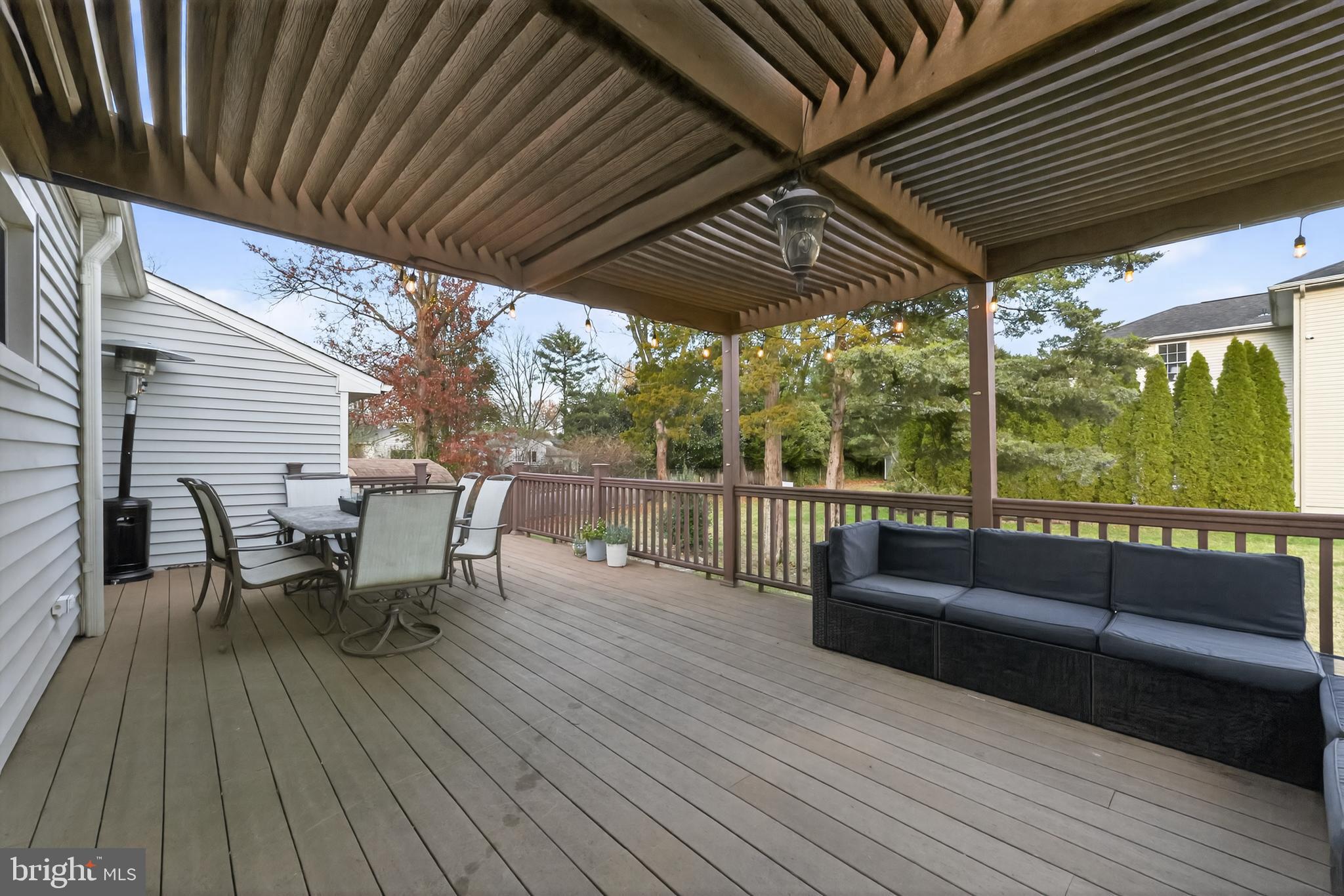 709 Manor Terrace Moorestown, NJ 08057 - Photo 35 of 37 a view of a patio with table and chairs