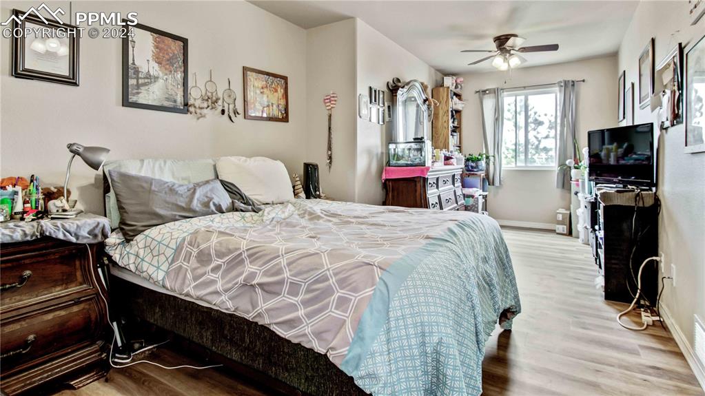 38115 Gieck Road Rush, CO 80833 - Photo 17 of 46 a bed sitting in a bedroom and chair