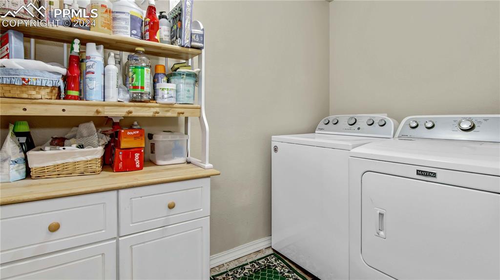 38115 Gieck Road Rush, CO 80833 - Photo 31 of 46 a utility room with dryer and washer