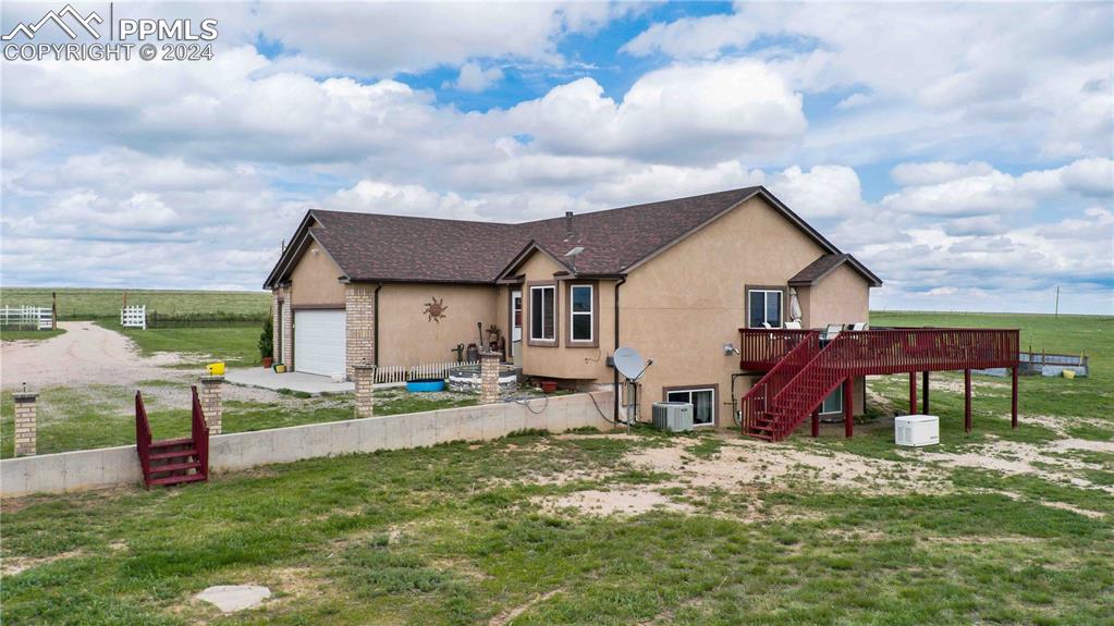 38115 Gieck Road Rush, CO 80833 - Photo 42 of 46 a view of a house with backyard and sitting area
