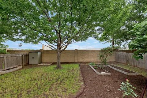 a backyard of a house with lots of green space