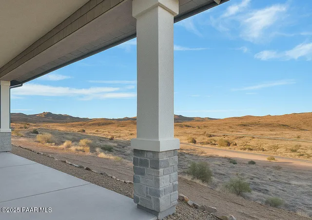 a view of an ocean and a mountain