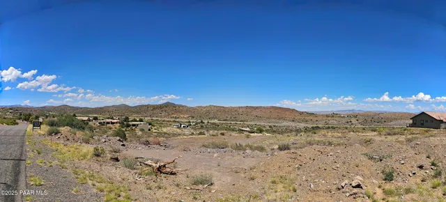 a kitchen with stainless steel appliances a stove a sink refrigerator and a stove