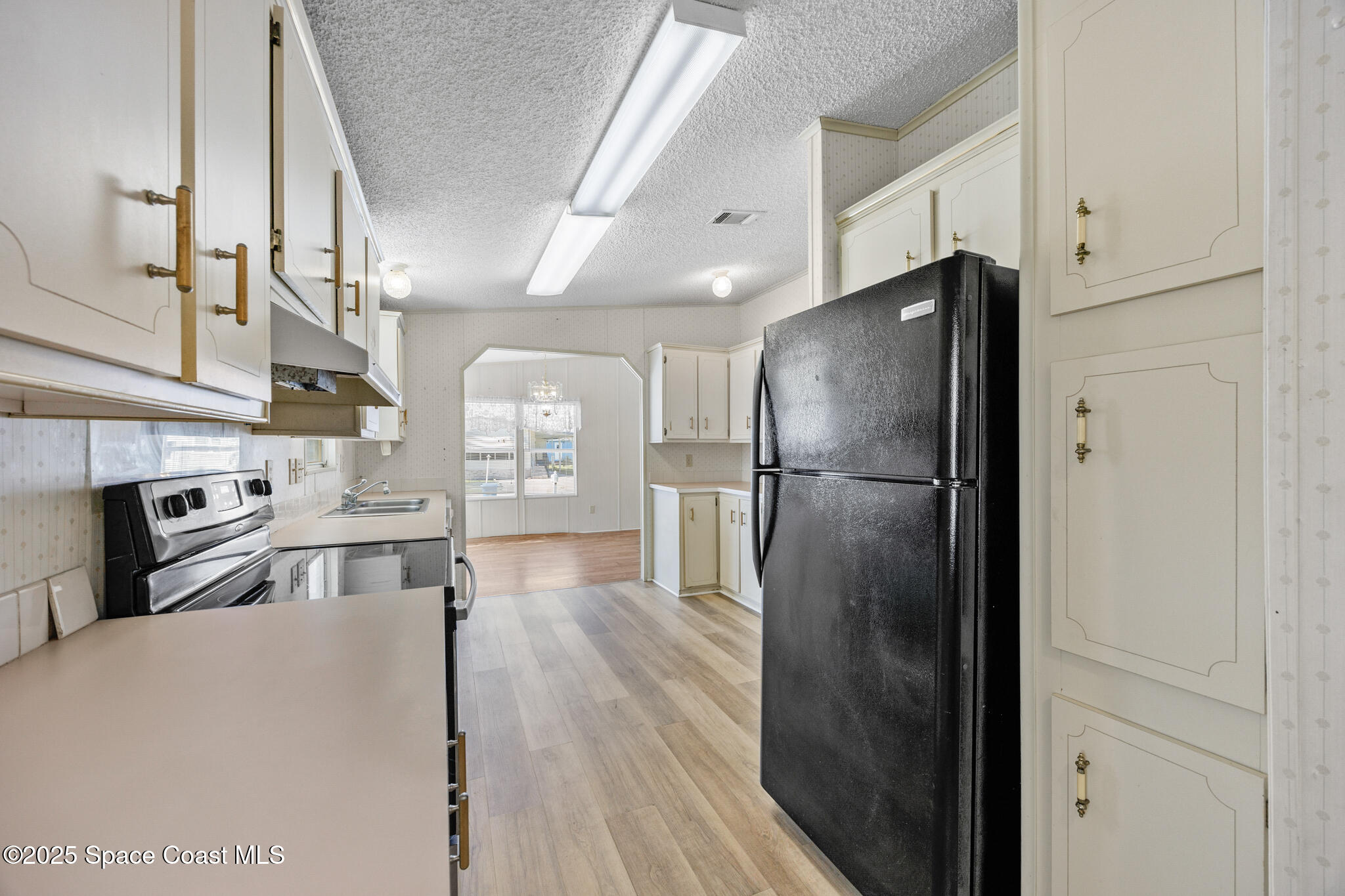 2387 Coconut Palm Drive Palm Bay, FL 32905 - Photo 6 of 22 a-23