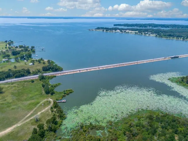 a view of a lake with a city view