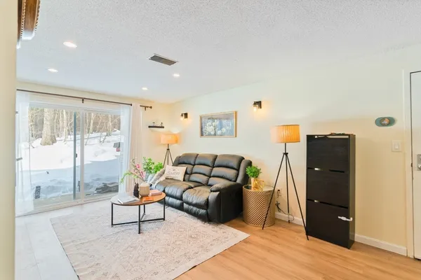 a living room with furniture and a gate