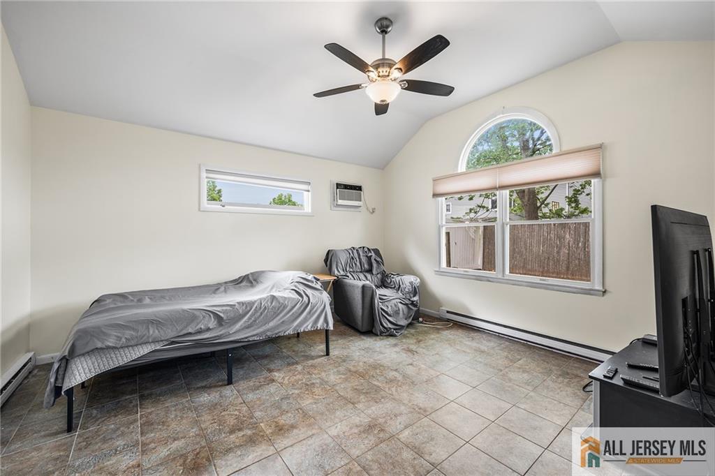 67 Drake Place Colonia, NJ 07067 - Photo 23 of 31 a bedroom with a bed and a window