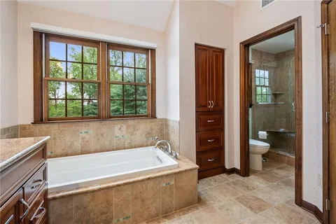 a work room with furniture and window