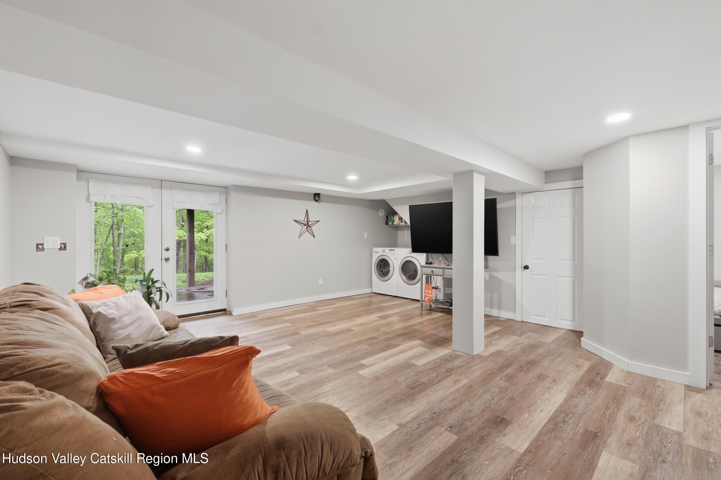 186 Cedar Hill Road High Falls, NY 12440 - Photo 24 of 33 a living room with furniture and large windows