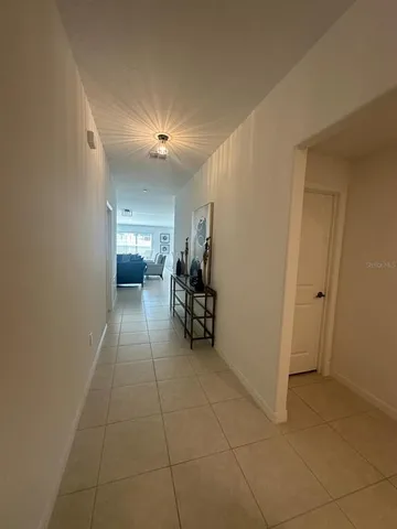 a bedroom with bed and window