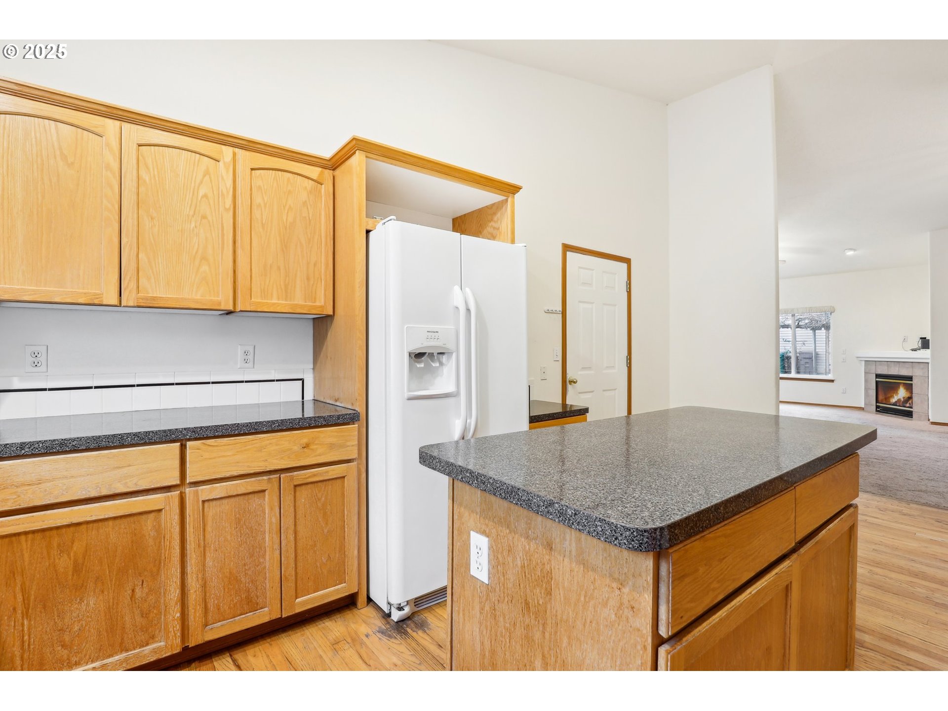 18222 Davis Street Sandy, OR 97055 - Photo 17 of 42 a kitchen with stainless steel appliances granite countertop a sink cabinets and refrigerator