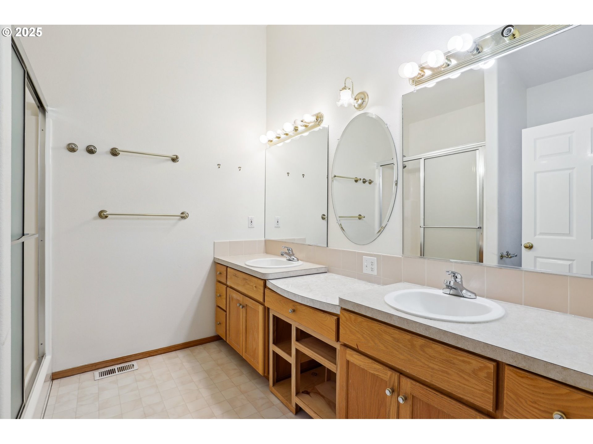 18222 Davis Street Sandy, OR 97055 - Photo 30 of 42 a bathroom with a double vanity sink mirror and