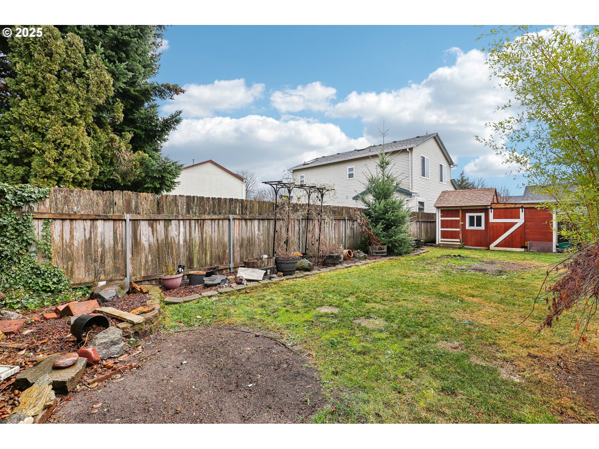 18222 Davis Street Sandy, OR 97055 - Photo 37 of 42 a backyard of a house with table and chairs
