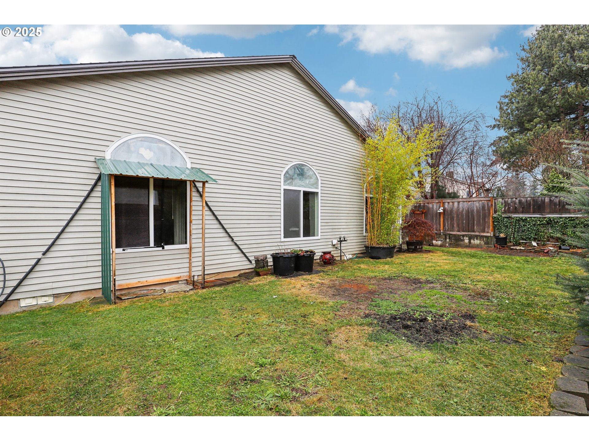18222 Davis Street Sandy, OR 97055 - Photo 40 of 42 a view of a house with a backyard