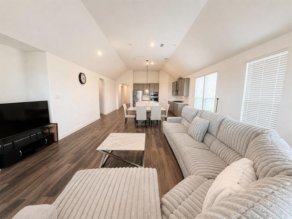 3598 Furrow Road Frisco, TX 75035 - Photo 9 of 14 a living room with furniture and a flat screen tv