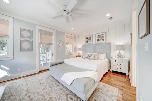 a spacious bedroom with a large bed and a window