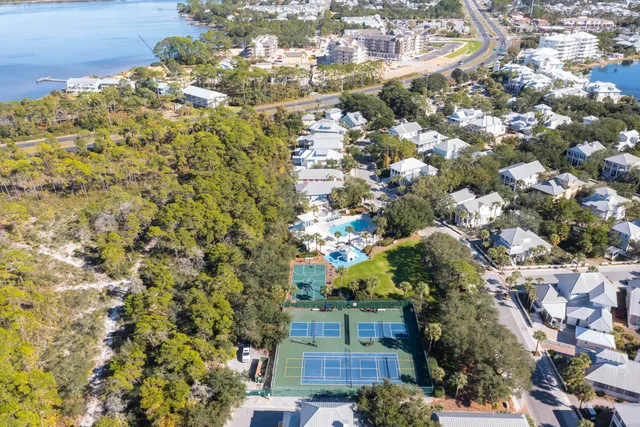 a view of a pathway with a wall in the background
