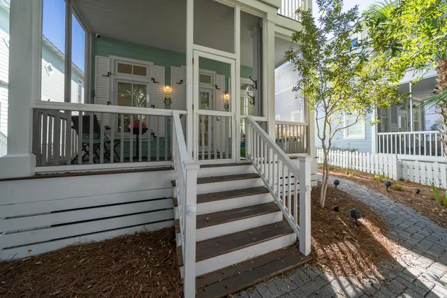 a view of stairs and wooden floor