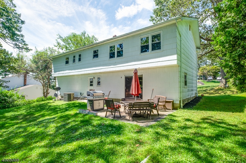 14 Ash Lane Randolph, NJ 07869 - Photo 16 of 22 a view of house with a backyard and sitting area