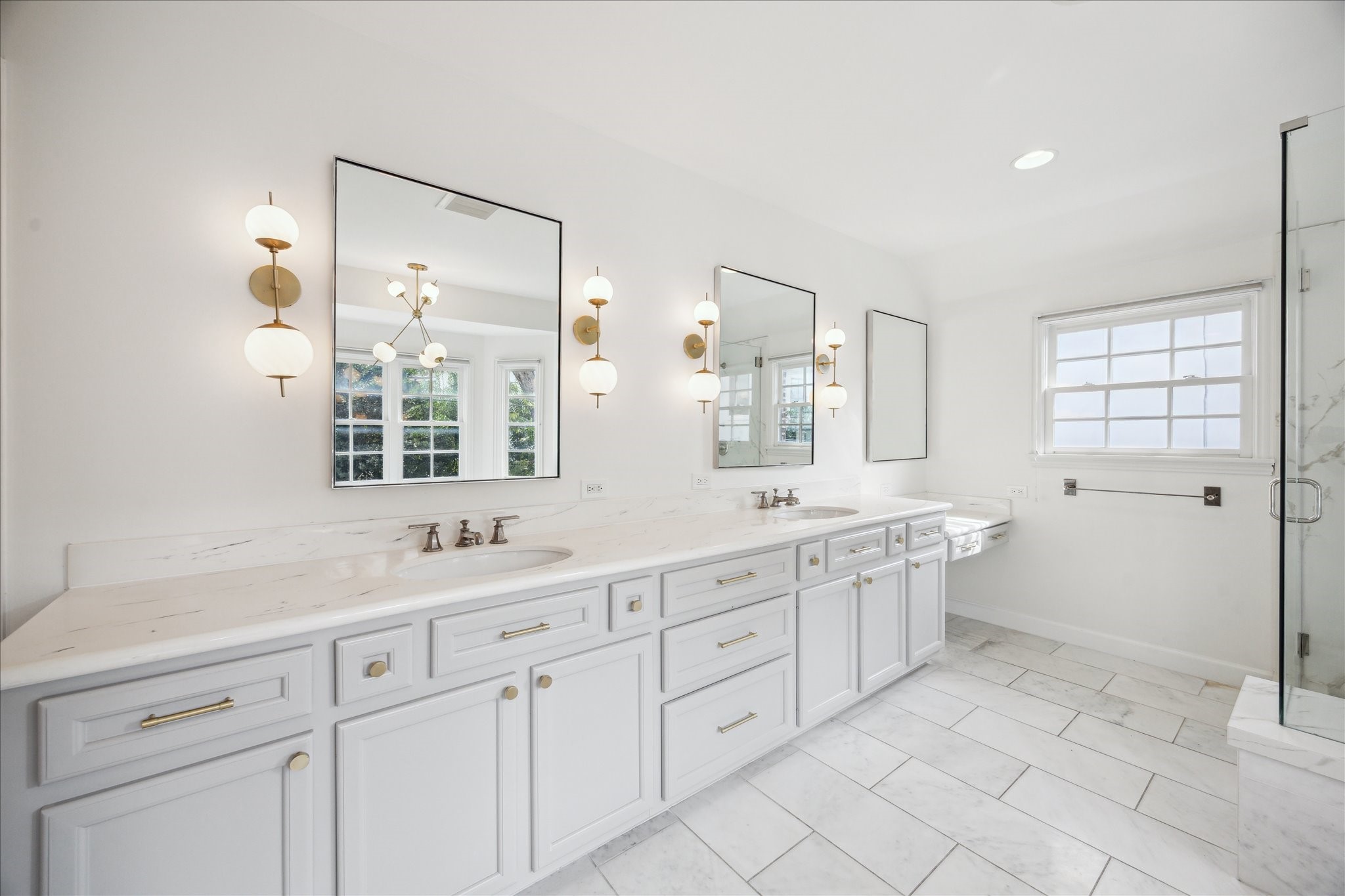 2117 Chilton Road Houston, TX 77019 - Photo 30 of 50 a spacious bathroom with a granite countertop sink mirror and a