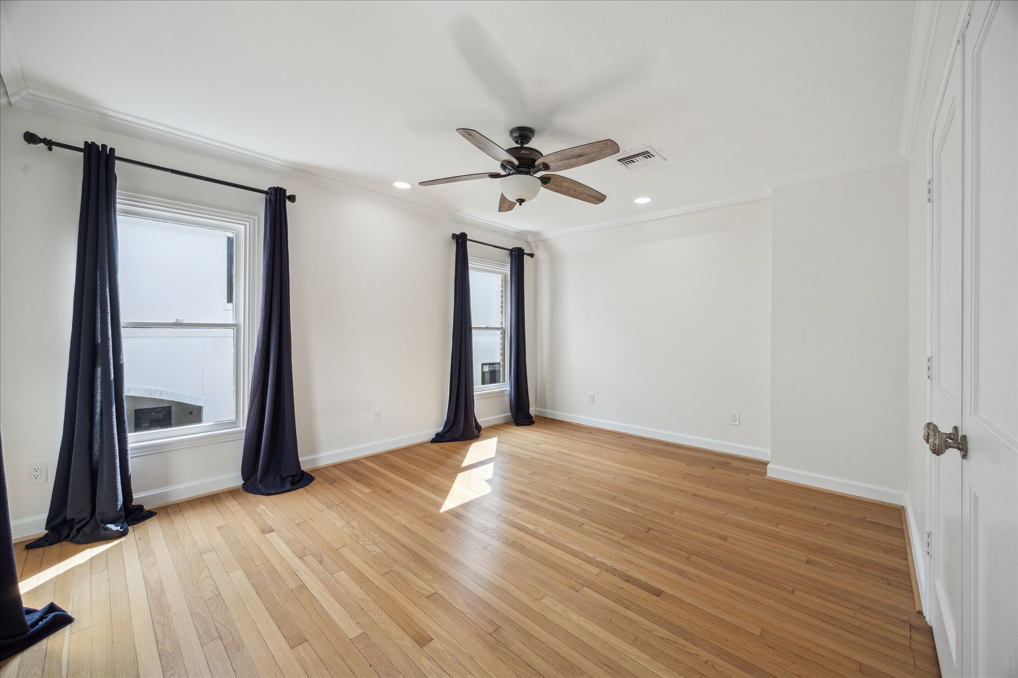 2117 Chilton Road Houston, TX 77019 - Photo 31 of 50 wooden floor in an empty room with a window