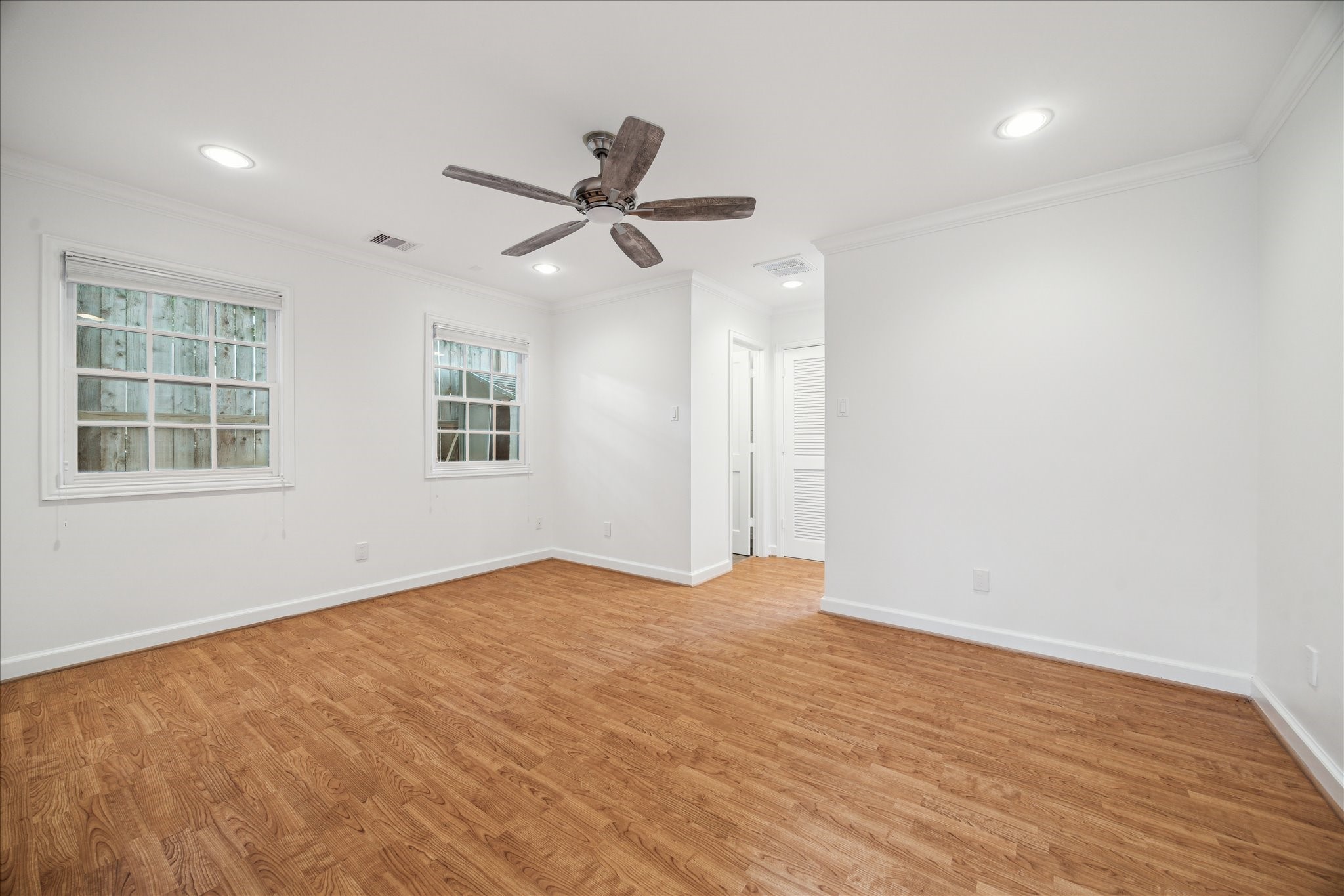 2117 Chilton Road Houston, TX 77019 - Photo 41 of 50 wooden floor in an empty room with a window