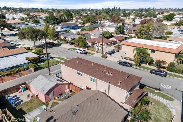 an aerial view of a city with lots of residential buildings