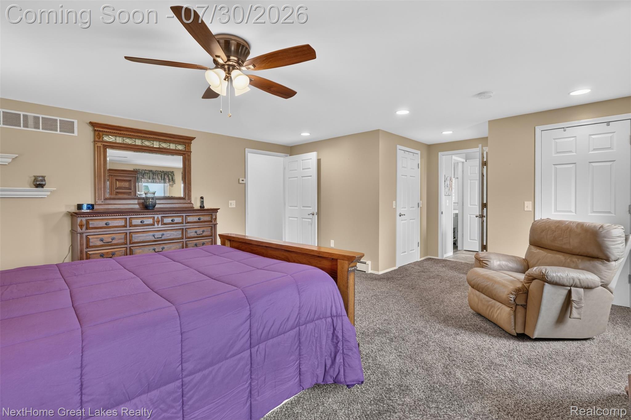 6249 North New Lothrop Road New Lothrop, MI 48460 - Photo 28 of 50 Carpeted room featuring a ceiling fan with integrated lighting, recessed lighting, and multiple paneled doors