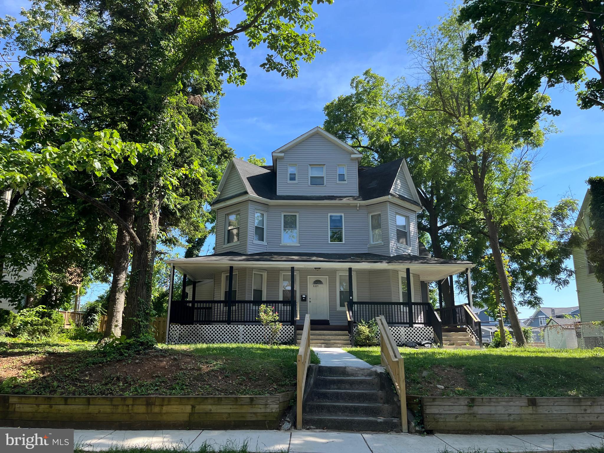 4107 Ridgewood Avenue Baltimore, MD 21215 - Photo 1 of 29 front view of house with a yard