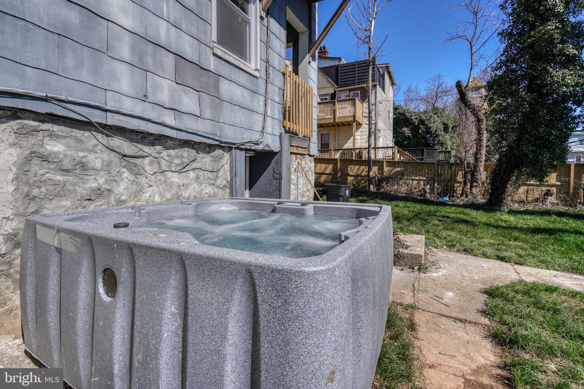 4107 Ridgewood Avenue Baltimore, MD 21215 - Photo 15 of 29 a view of a house with a sink and yard