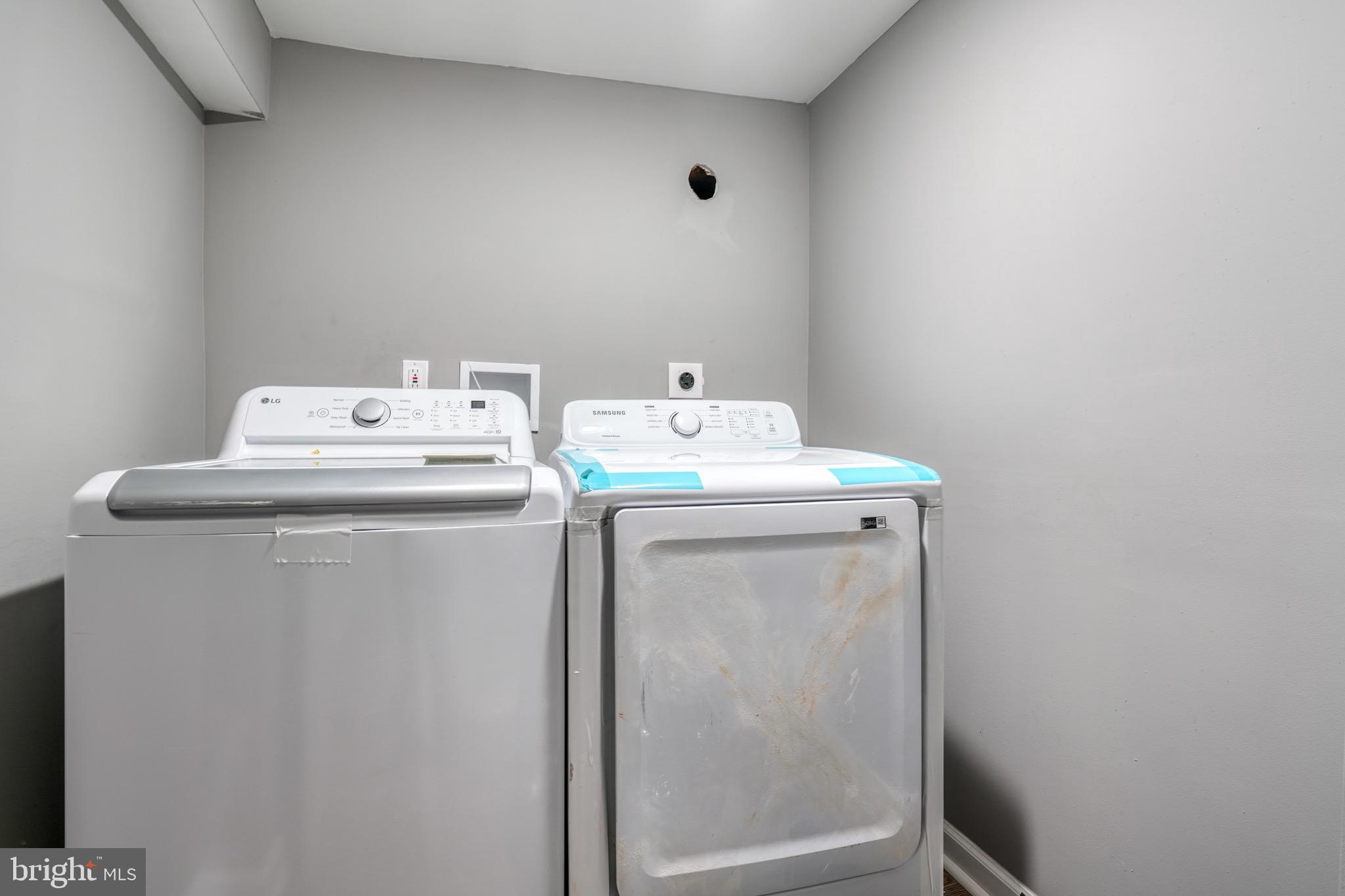 4107 Ridgewood Avenue Baltimore, MD 21215 - Photo 17 of 29 a utility room with dryer and washer