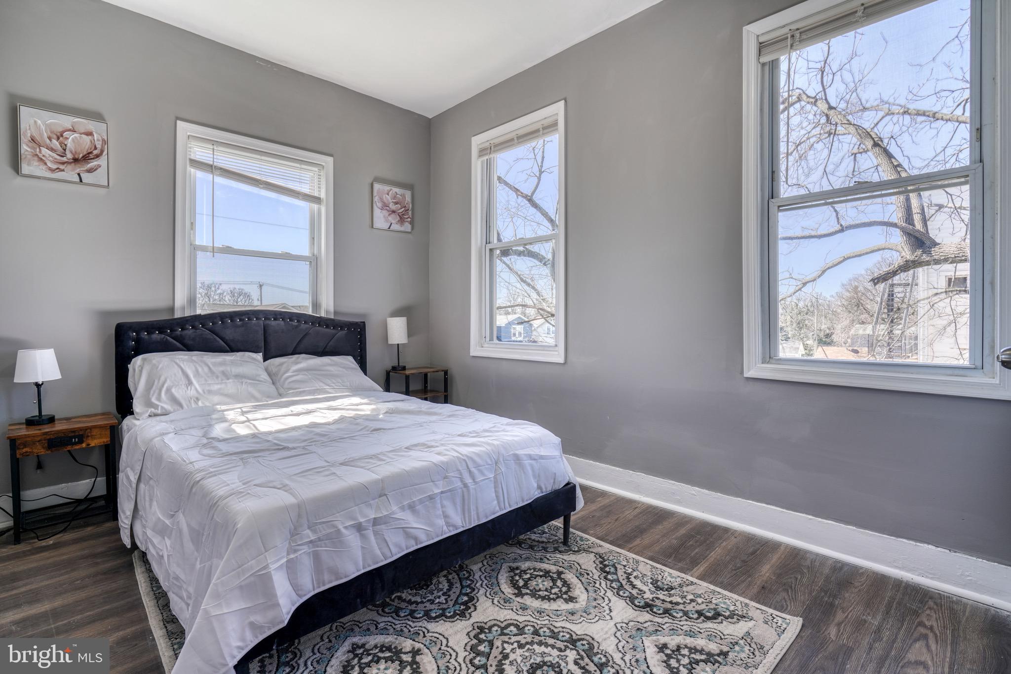 4107 Ridgewood Avenue Baltimore, MD 21215 - Photo 29 of 29 a bedroom with a bed and a window